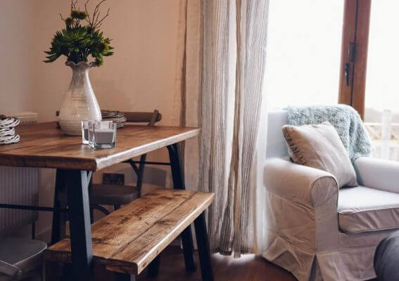 A side table and a sofa